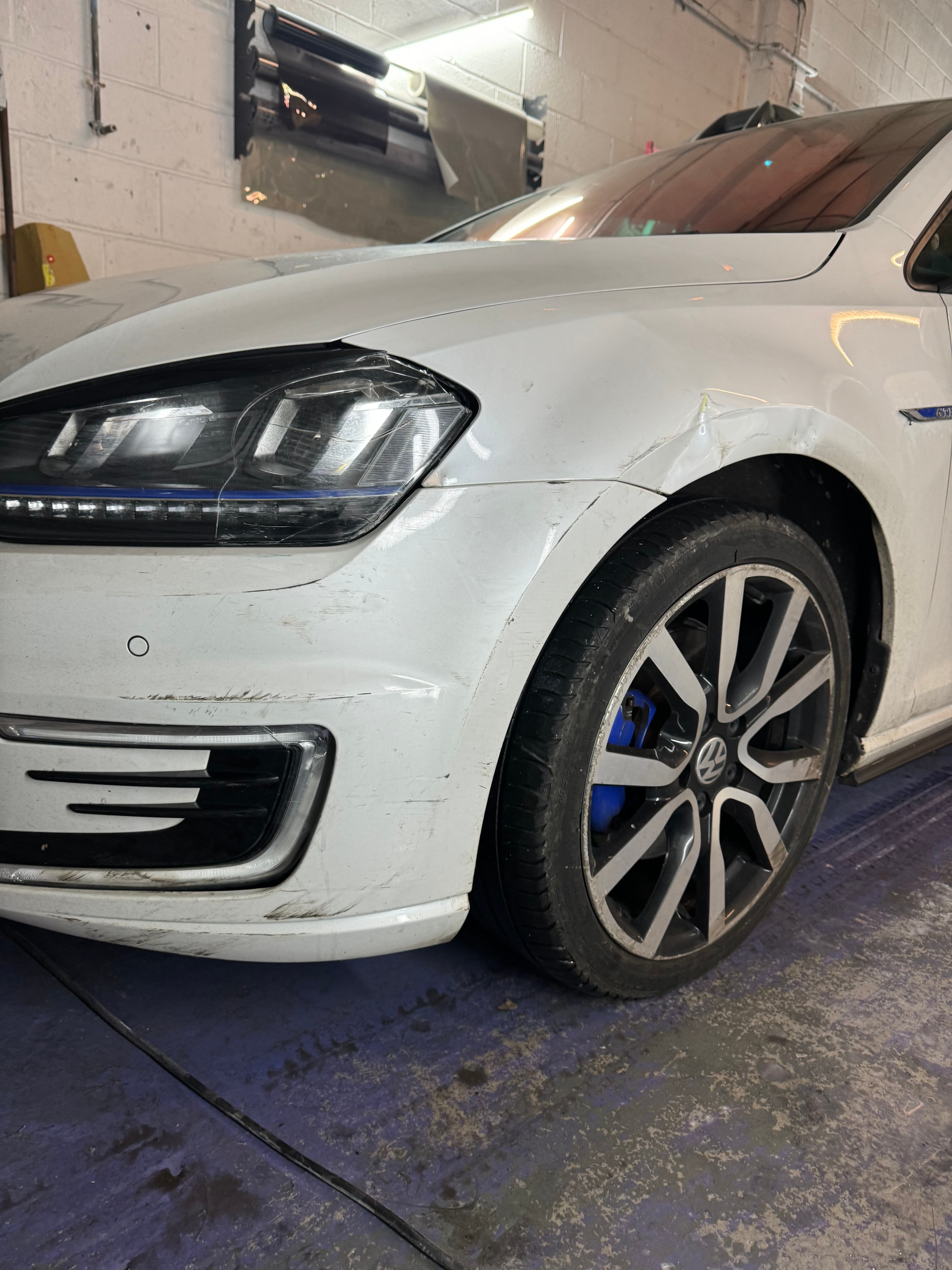 Front bumper & wing repair - before