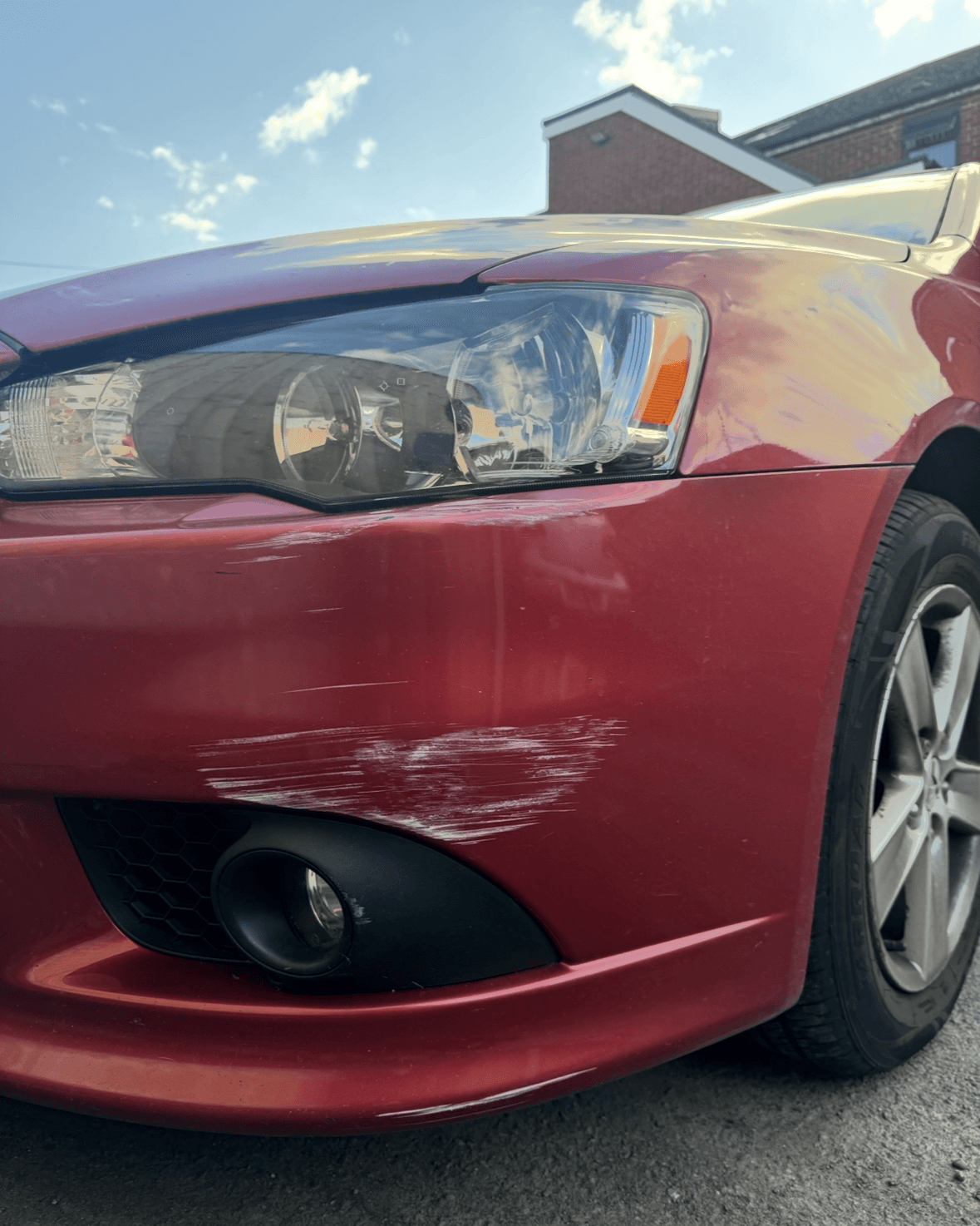 Front bumper scuff repair - before